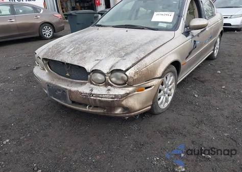 2003 Jaguar X-Type 2.5L Auto/2.5L Manual z USA, uszkodzony, nr VIN SAJEA51D73XD42031